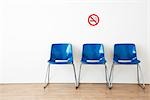 Row of Blue Chairs in Waiting Room