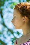 Young red haired woman in profile, portrait