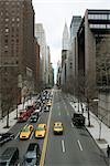 Traffic on busy city street, high angle view