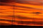 Power Transmission Pylons at Sunset