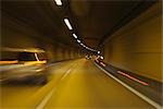 Cars Driving in Tunnel