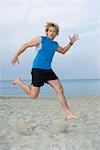 Man Jumping at Beach, Ibiza, Spain