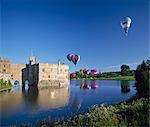 Hot air balloons taking off from Leeds Castle grounds, Kent, England, United Kingdom, Europe