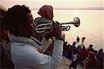 Musicians herald the rising of Lord Surya (sun god), Sun Worship Festival, Varanasi, Uttar Pradesh state, India, Asia