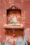 Decorative child's toy parrot in traditional wall niche, restored traditional Pol house, Ahmedabad, Gujarat state, India, Asia