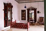 Seating area with traditional hitchkar suspended swing seat in restored traditional Pol house, Ahmedabad, Gujarat state, India, Asia