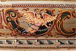 Detail of the painted ceiling done in the European style in bedroom of restored traditional Pol house, Ahmedabad, Gujarat state, India, Asia