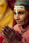 Pilgrim at prayer on the ghats, Varanasi, India, Asia