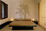 Bedroom suite with dramatic marble relief depiction of banana trees, Devi Garh Fort Palace Hotel, near Udaipur, Rajasthan state, India, Asia