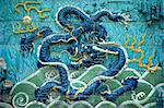 Dragons on tiles on the Dragon wall in the Forbidden City in Beijing, China, Asia