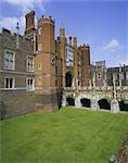 Bridge over moat to entrance gate, Hampton Court Palace, London, England, United Kingdom, Europe