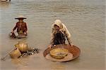 Women panning for gold in the waters of the Mekong River in Vietnam, Indochina, Southeast Asia, Asia