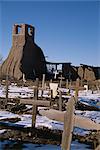 Snow on the ground in February in the old churchyard which was destroyed in the 1847 revolt when 150 Indians died, Taos Pueblo, UNESCO World Heritage Site, Taos, New Mexico, United States of America (U.S.A.), North America