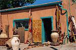 Assorted ethnic items on display outside shop, Guadalupe Street, Sante Fe, New Mexico, United States of America, North America