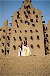 Portrait of man outside the Great Mosque, the largest dried earth building in the world, UNESCO World Heritage Site, Djenne, Mali, Africa