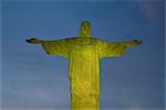 Floodlit statue of Christ the Redeemer at 710m on Mount Corcovado, above Rio de Janeiro, Brazil, South America