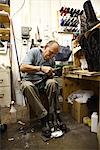 Shoemaker in Workshop, Maida's Blackjack Boot Company, Houston, Texas, USA