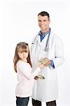 Young Girl Giving Money to Doctor