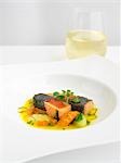 Seared Salmon With Salmon Skin and Vegetable Reduction, and a Glass of White Wine