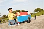 Boy reparing soap box