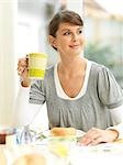 Woman having breakfast