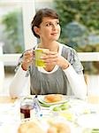 Woman having breakfast