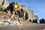 Road Biker riding downhil, Dolomites