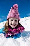 child playing in snow