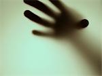 silhouette of a hand close-up