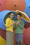 Portrait of two young women, Bo Sang umbrella village, Chiang Mai, northern Thailand, Asia