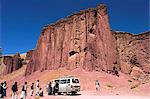 Tourist and locals at the Magenta cliffs near Shahr-e-Zohak (Red City), between Kabul and Bamiyan (the southern route), Bamiyan province, Afghanistan, Asia