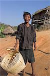 Ann man carrying cane basket he is making, Ann Village, Kengtung (Kyaing Tong), Shan state, Myanmar (Burma), Asia