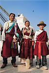 Tibetan family in traditional clothes, Lhosar Tibetan and Sherpa New Year festival, Bodhnath Buddhist stupa, UNESCO World Heritage Site, Kathmandu, Bagmati, Nepal, Asia
