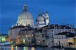 View along Grand Canal towards Santa Maria Della Salute church at night, Venice, UNESCO World Heritage Site, Veneto, Italy, Europe