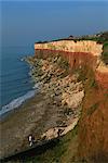 Rockfalls from red and white chalk cliff, Hunstanton, Norfolk, England, United Kingdom, Europe