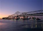 Mississippi River Bridge in the evening and city beyond, New Orleans, Louisiana, United States of America (USA), North America