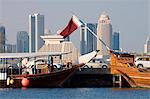 Dhows in Doha Bay and city skyline, Doha, Qatar, Middle East