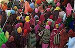 Women from villages crowd the street at the Camel Fair, Pushkar, Rajasthan state, India, Asia