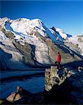 Hiker and view to the Breithorn and Breithorn Glacier, Gomergrat, Zermatt, Valais, Switzerland, Europe