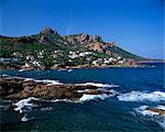 View across bay to the village and Pic du Cap Roux, Antheor, Corniche de l'Esterel, Var, Cote d'Azur, French Riviera, Provence, France, Mediterranean, Europe