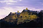 Illuminated cliffs of the Pena Nueva, with churches of Santa Maria and San Pedro on top, Arcos de la Frontera, Cadiz, Andalucia (Andalusia), Spain, Europe