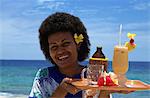 Waitress with fruit cocktail, Navini Island, Fiji, Pacific Islands, Pacific