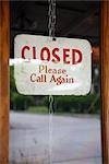 Close-up of Closed Sign on Door