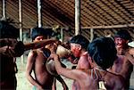 Yanomami drinking plantain soup at feast, Brazil, South America