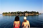 Girls looking at view, Tobacco Cay, Belize, Central America