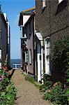 Cottages and sea, Southwold, Suffolk, England, United Kingdom, Europe