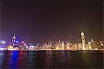 Light show over Hong Kong Island skyline, Hong Kong, China, Asia