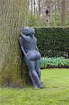 Modern sculpture of nude couple embracing, Keukenhof, park and gardens near Amsterdam, Netherlands, Europe