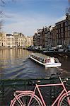 Tourist canal boat on the Herengracht canal, Amsterdam, Netherlands, Europe