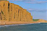 Cliffs towering over West Bay Beach, Dorset, England, United Kingdom, Europe